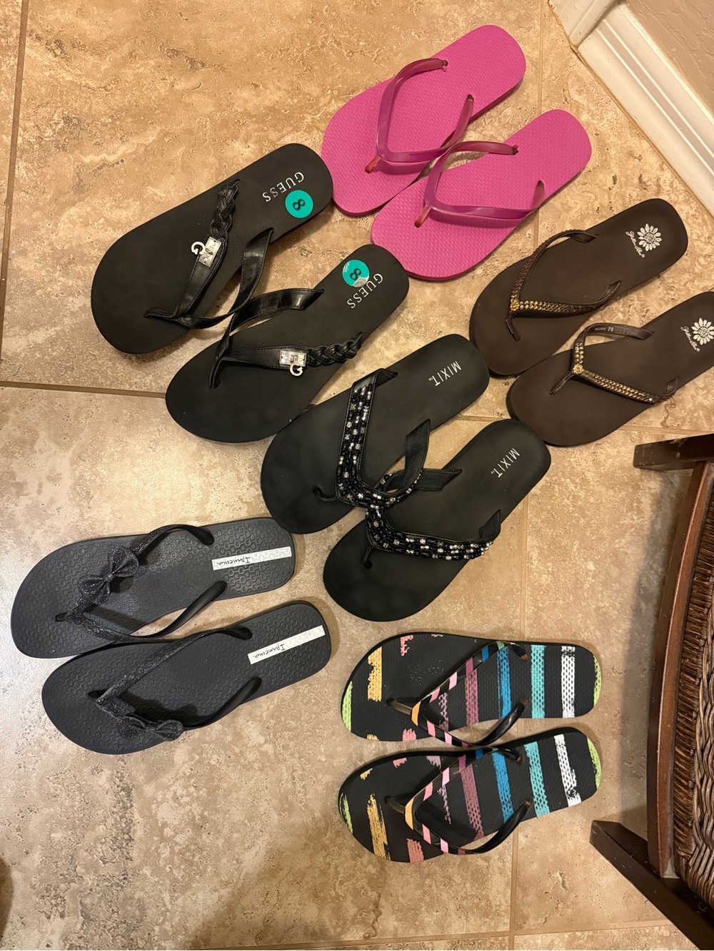 6 pairs of flip flops